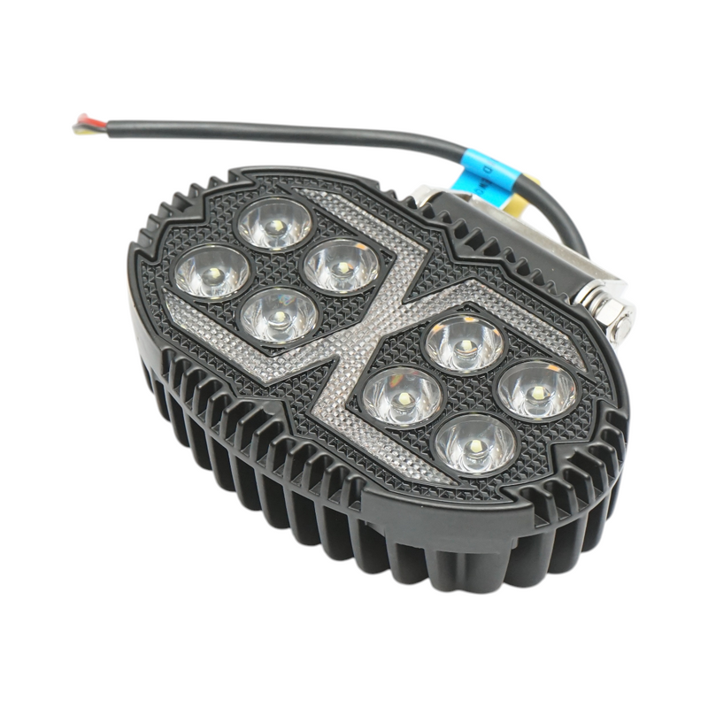 Faro da lavoro a LED ovale con DRL, 9-80 V, 24 W (bianco/giallo), corpo in alluminio 140x90x45 mm, IP67 Breckner Germany